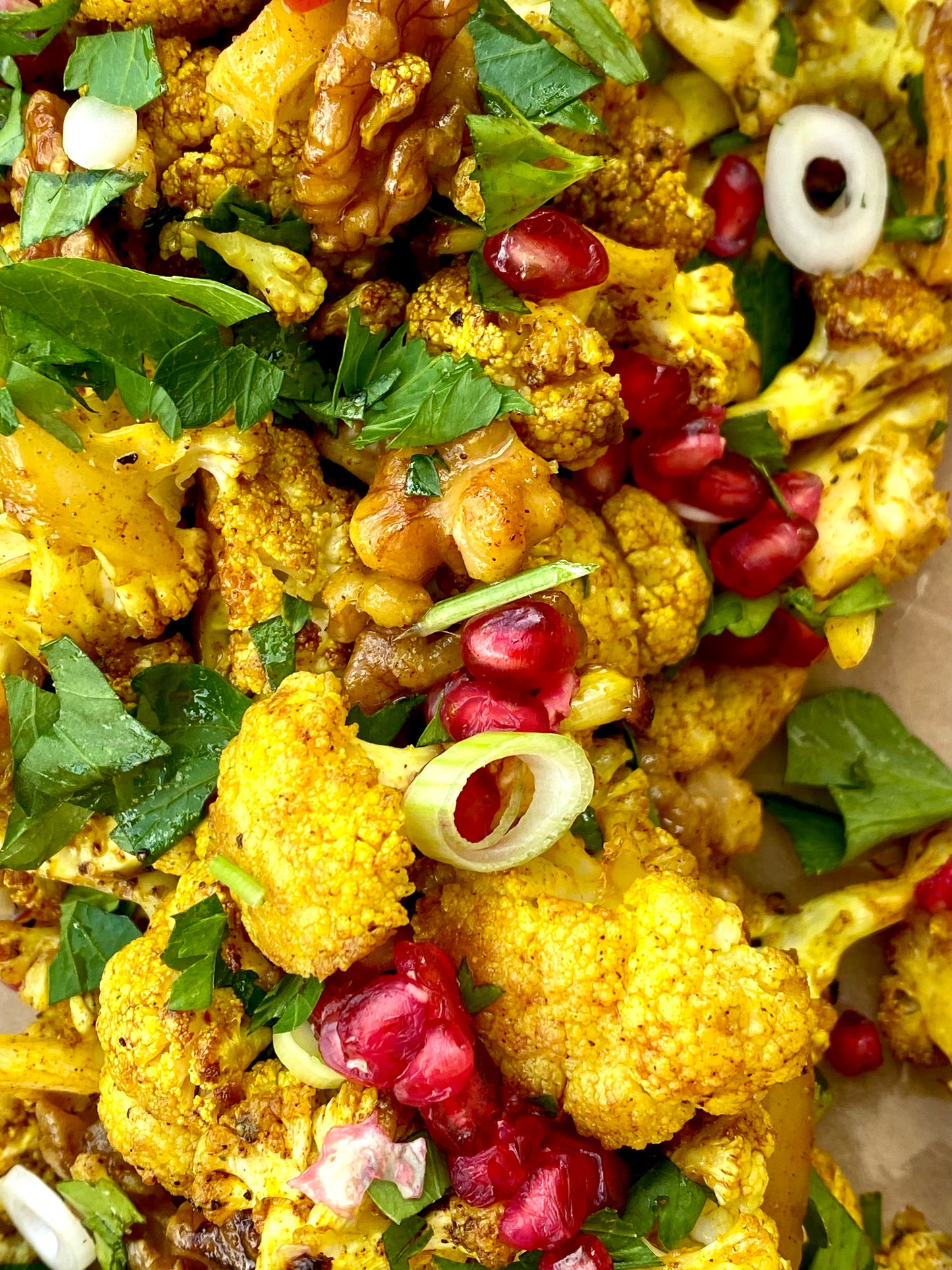 Roasted Cauliflower Turmeric, Walnut & Pomegranate Salad.