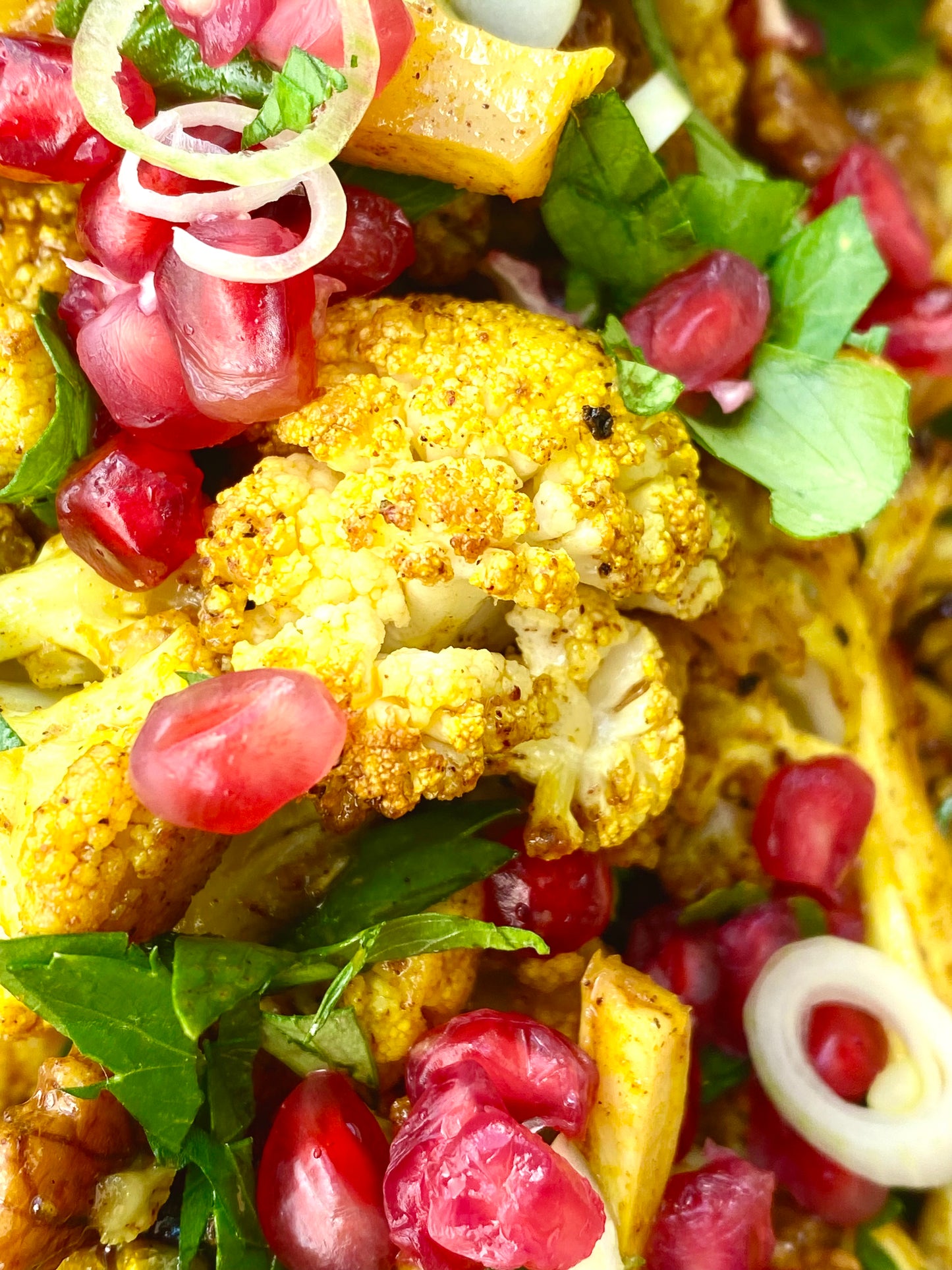 Roasted Cauliflower Turmeric, Walnut & Pomegranate Salad.
