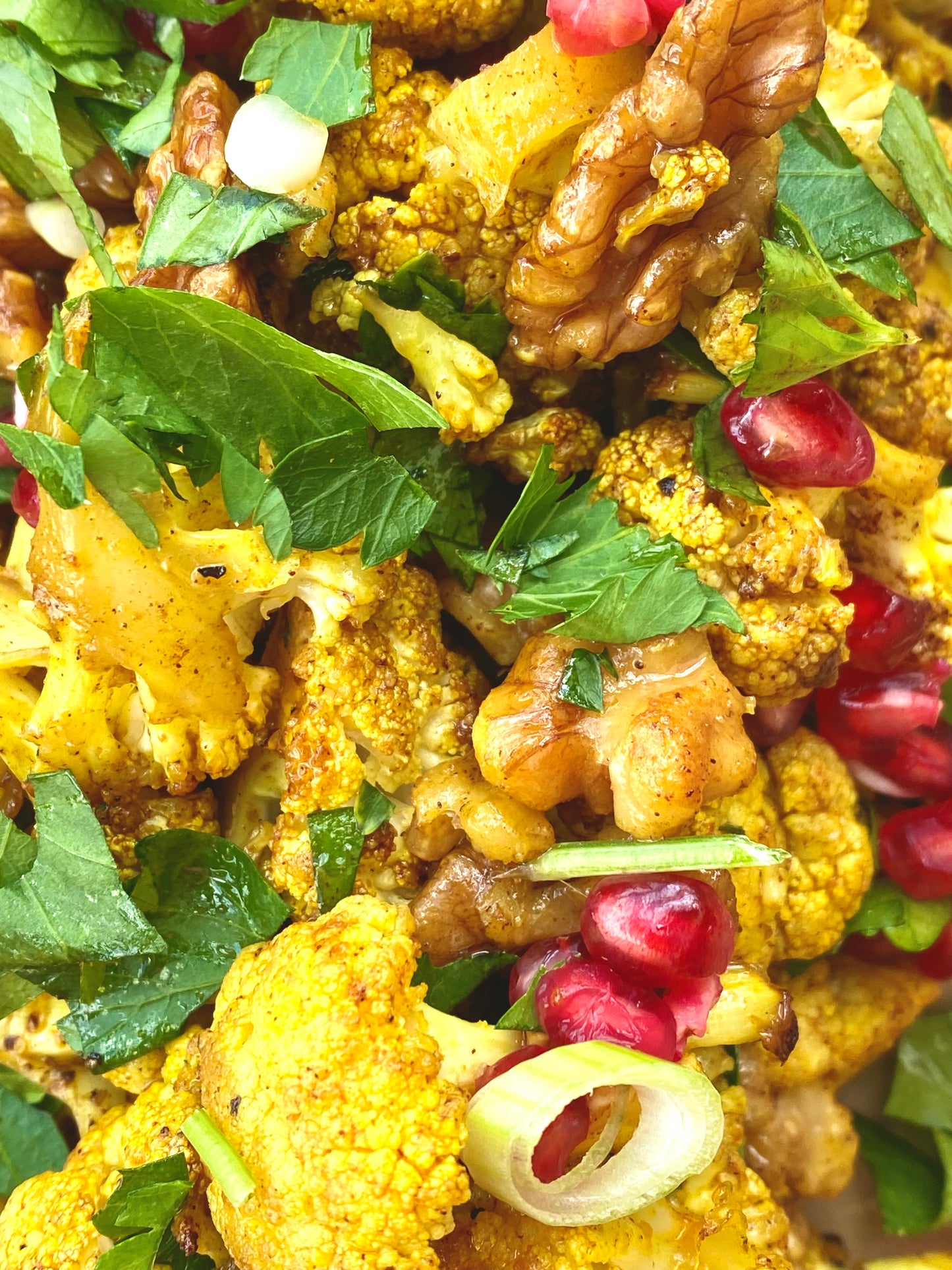 Roasted Cauliflower Turmeric, Walnut & Pomegranate Salad.